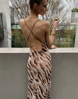 Robe longue à imprimé animalier dos nu
