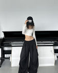 WARDEN EDGE Draped Cargo Pants with Wide Leg Silhouette and Adjustable Drawstring Hem