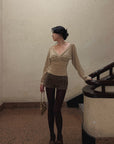 Hydrae Twist-Front Deep V-Neck Knit Top