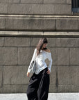 WARDEN EDGE Draped Off-Shoulder Ruched Long Sleeve Top