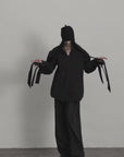 DOINDULGE Sculptural Ribbon Sleeve High Neck Shirt