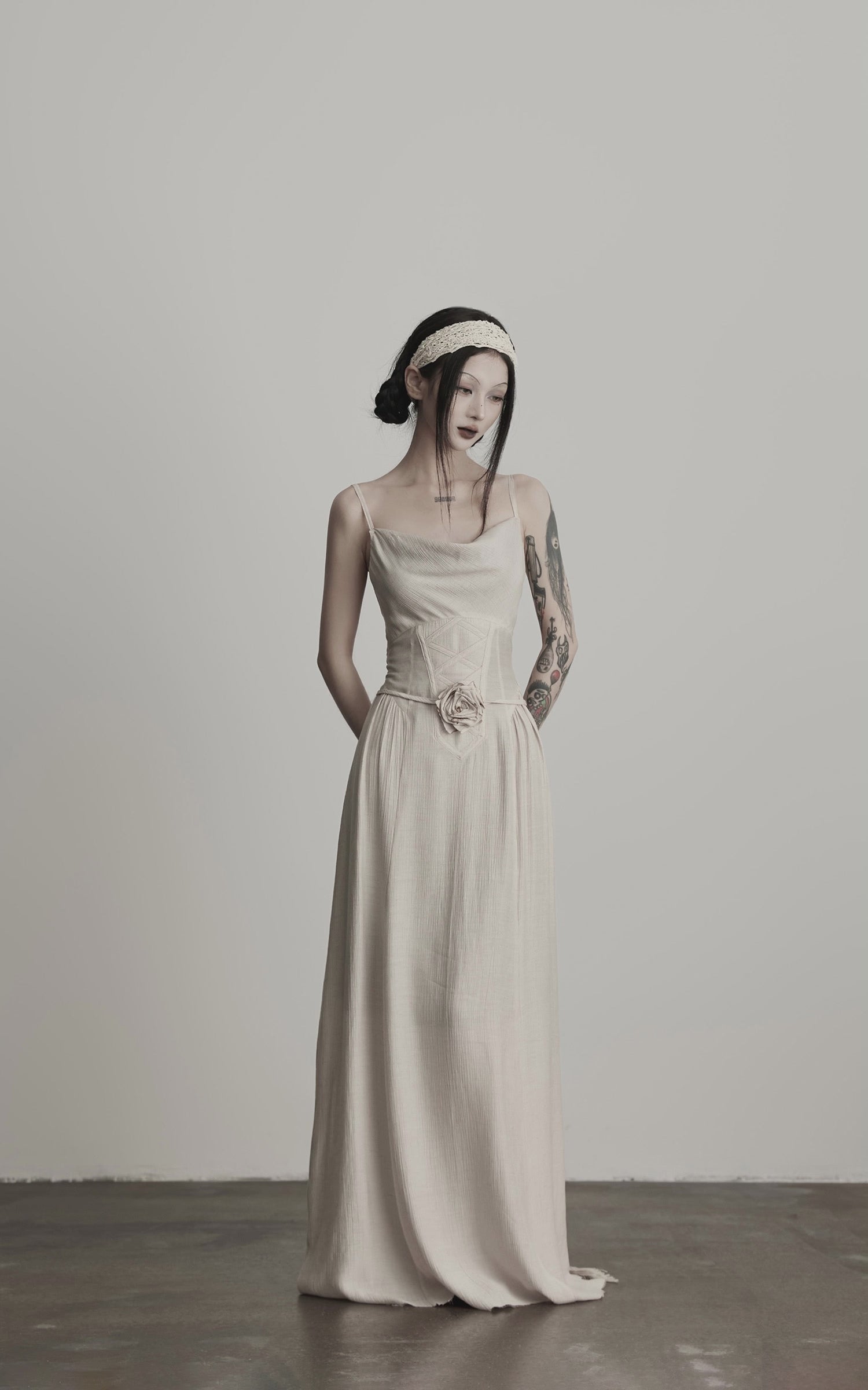 DOINDULGE Draped Maxi Dress with Corset Waist and Rosette Detail