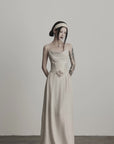 DOINDULGE Draped Maxi Dress with Corset Waist and Rosette Detail