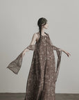 DOINDULGE Feather-Printed Halter Dress with Beaded Straps and Draped Silhouette