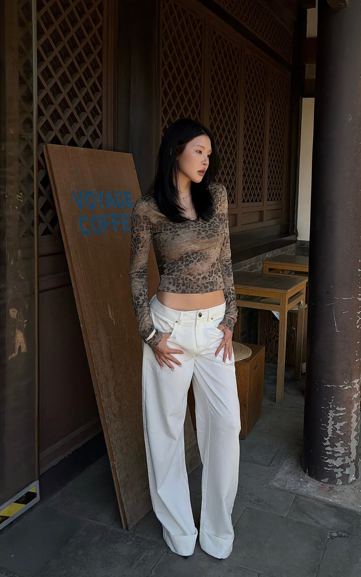 Hydrae Leopard Print Long Sleeve Top With Fitted Silhouette And Lace Trim Details