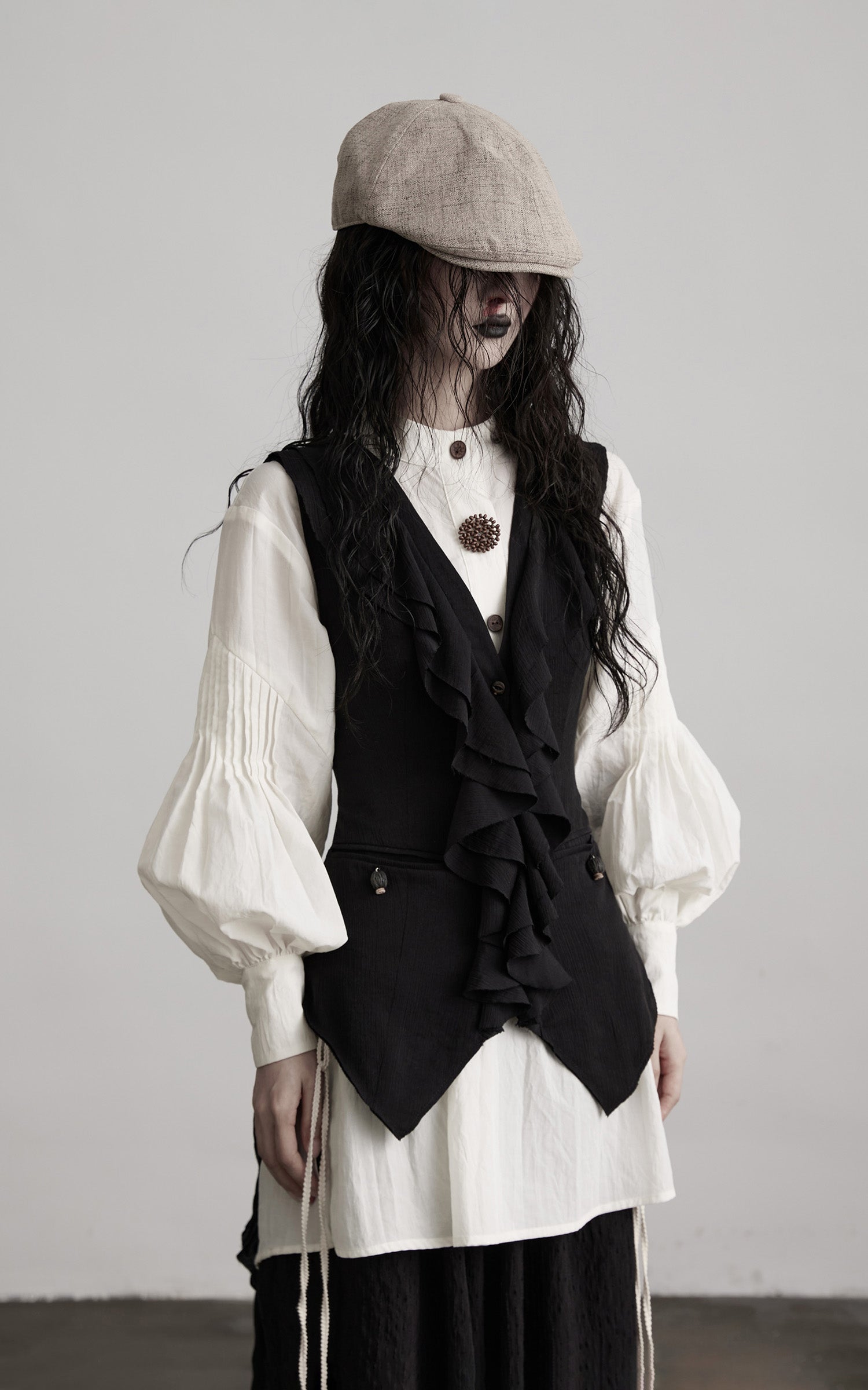 DOINDULGE Ruffled Tie Deconstructed Vest
