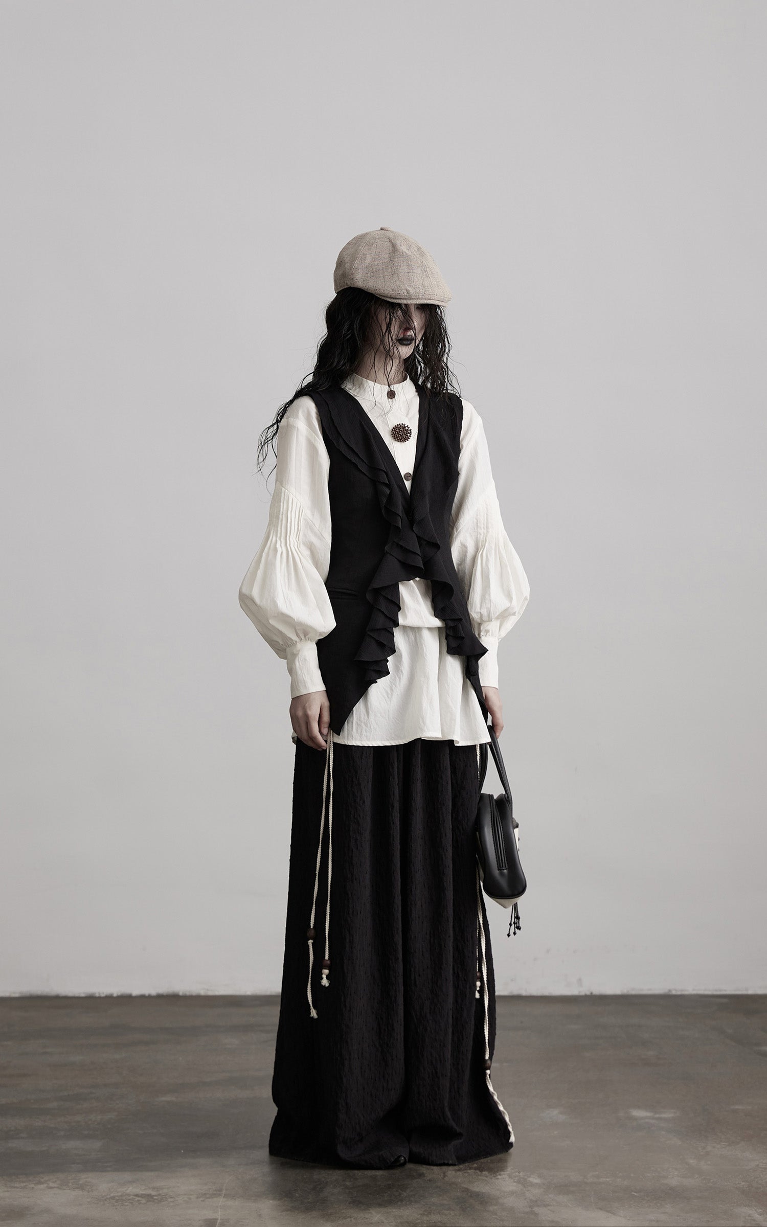 DOINDULGE Ruffled Tie Deconstructed Vest