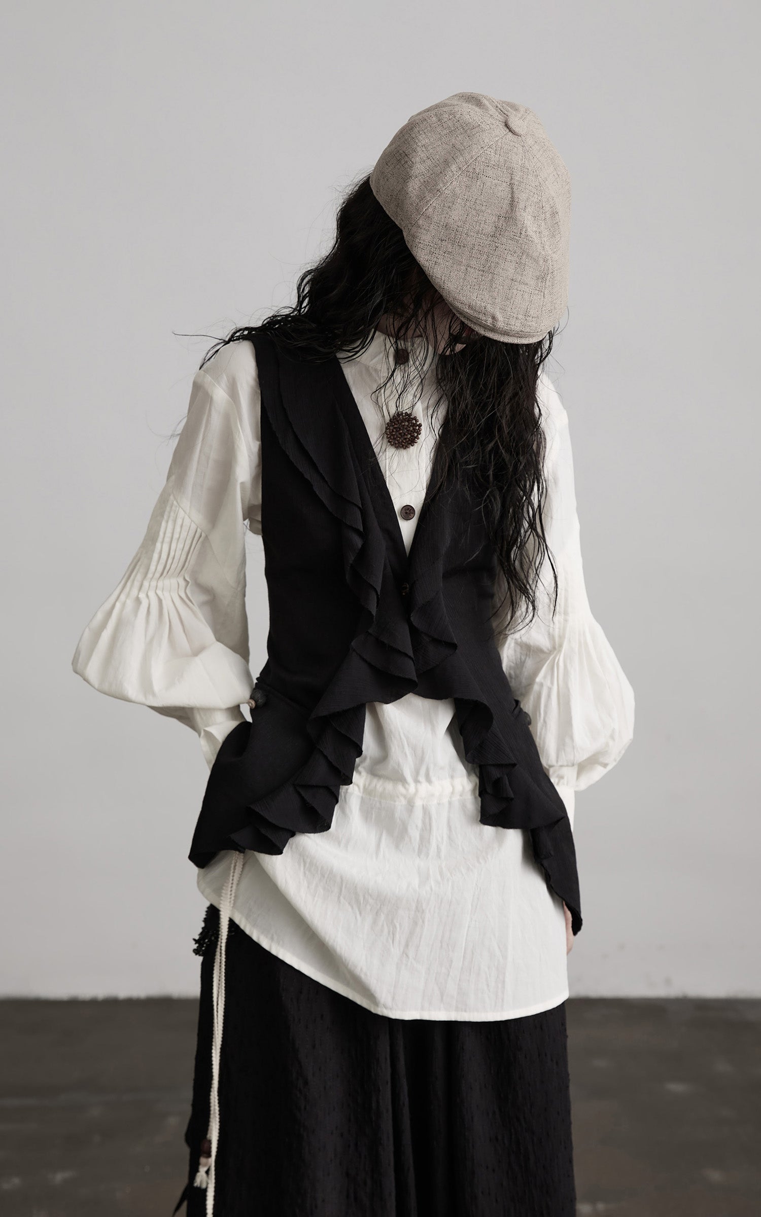 DOINDULGE Ruffled Tie Deconstructed Vest