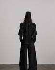 DOINDULGE Textured Wide-Leg Trousers with Draped Panels and Rope Detail