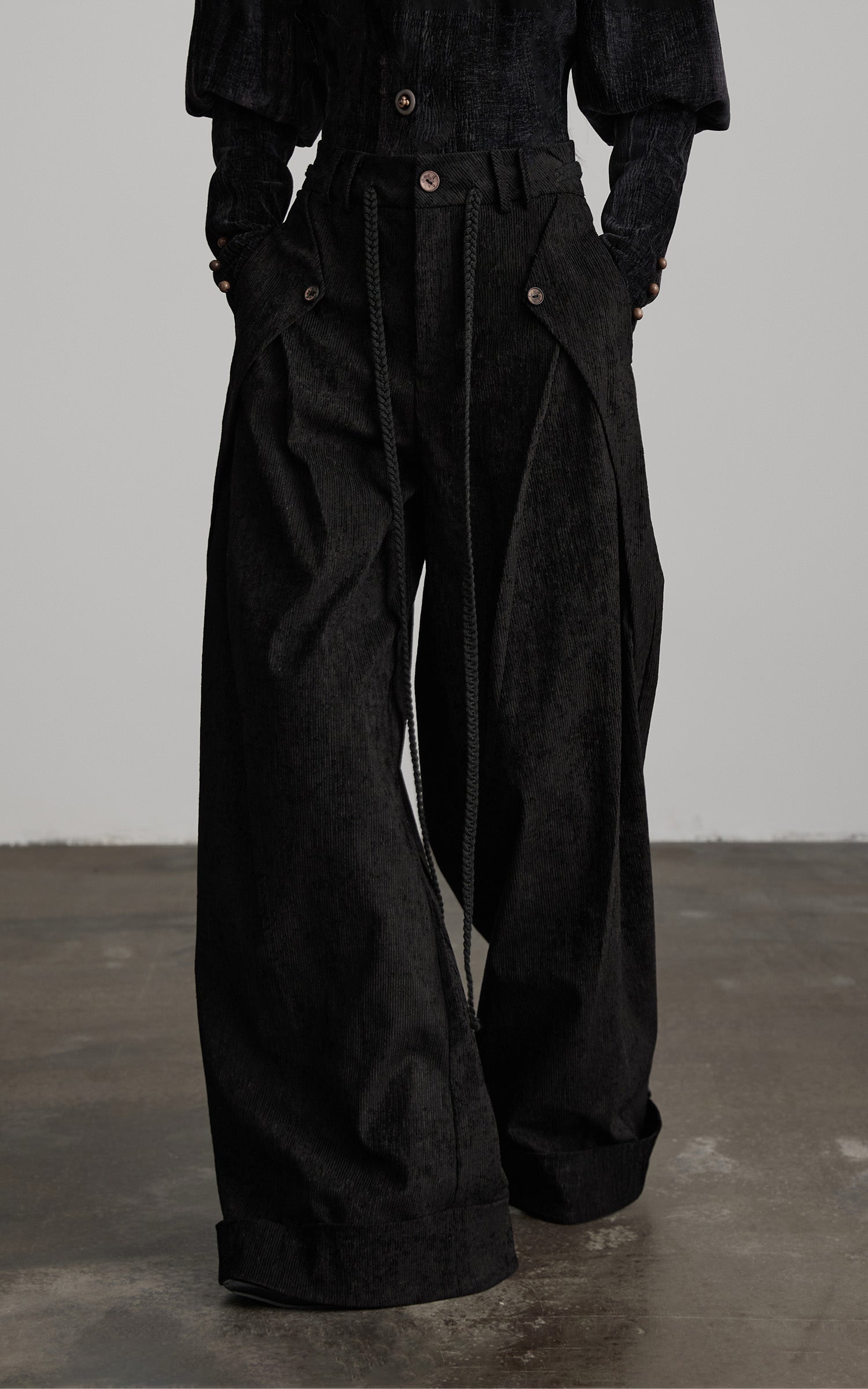DOINDULGE Textured Wide-Leg Trousers with Draped Panels and Rope Detail