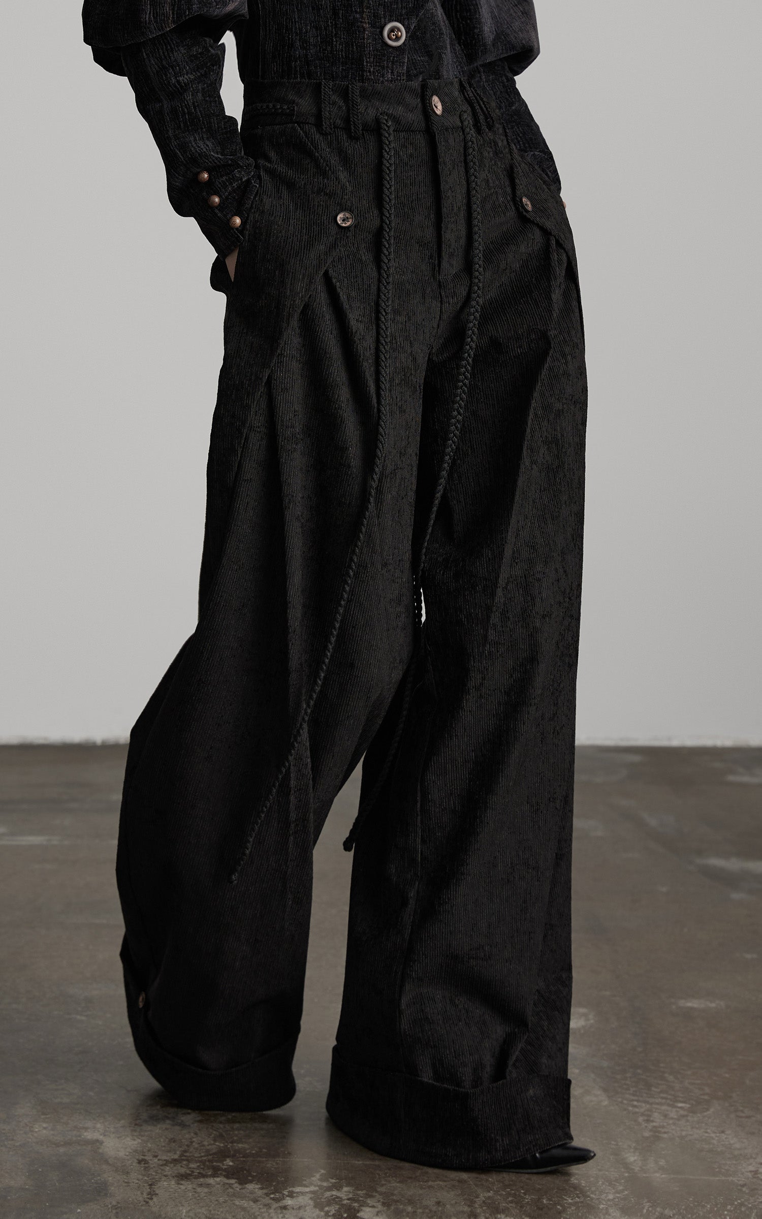 DOINDULGE Textured Wide-Leg Trousers with Draped Panels and Rope Detail