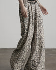 DOINDULGE Beaded Waist Wide Leg Pants